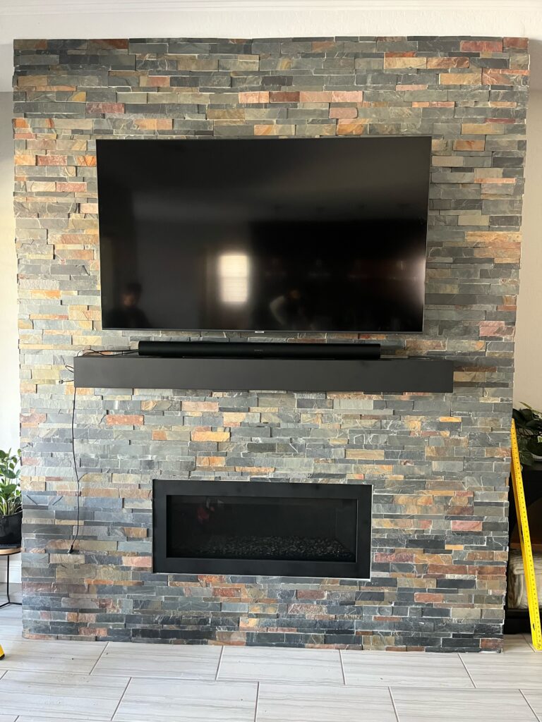 Mounted 65” TV onto Stone Wall Fireplace